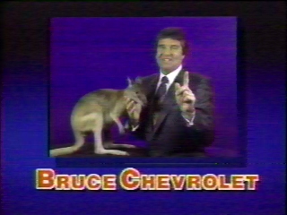 Bruce, the Australian car salesman, is still around today. Yes, that is a real kangaroo; he's always used them. I have no idea where he gets them from.